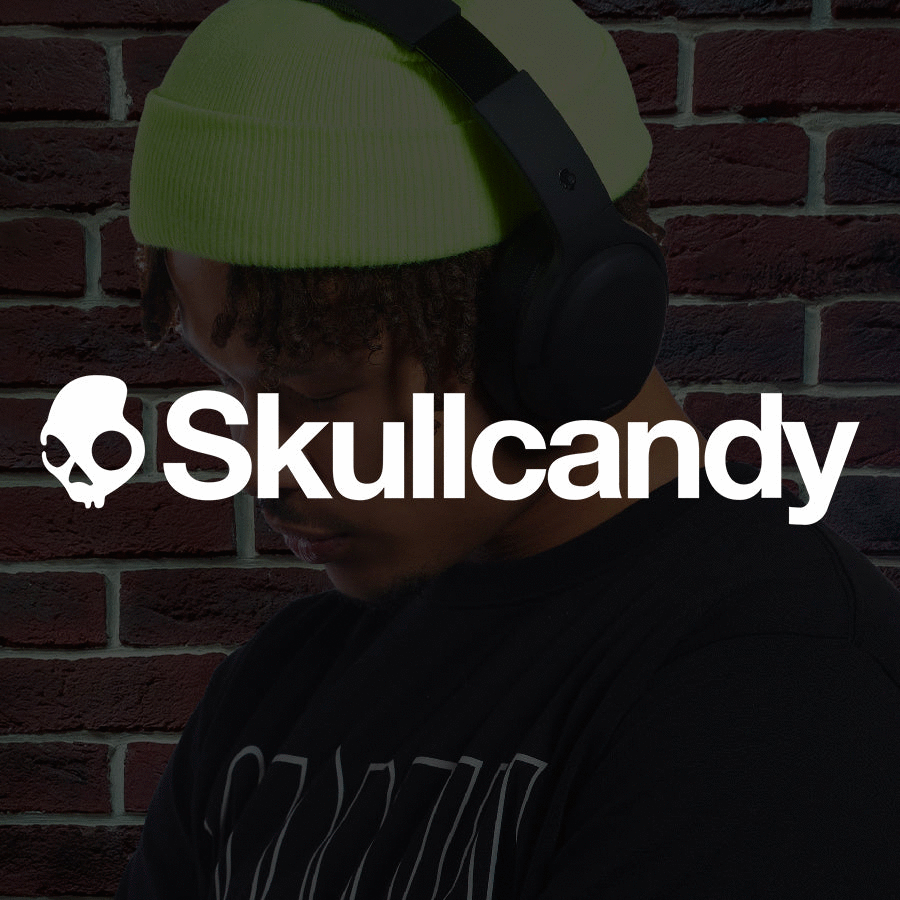 Skullcandy logo overlaid on a man wearing headphone with a neon green beanie